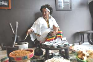 Elise Wozene performs a traditional Ethiopian coffee ceremony. Picture: CHARLENE MACAULAY