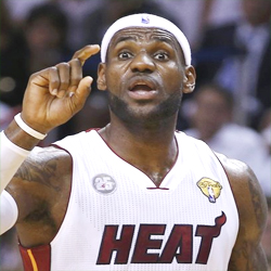 Miami Heat's LeBron James gestures to a teammate during the first quarter against the San Antonio Spurs in Game 7 of their NBA Finals basketball playoff in Miami, Florida June 20, 2013. REUTERS/Mike Segar 