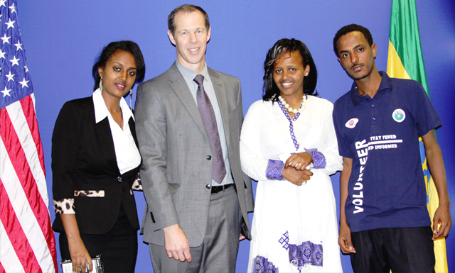 Public Affairs Officer Robert Post (second from left) with winning students (left to right): Feven Abreham, Etsubdink Hailu and Endalekachew Abebe. (Photo: U.S. Embassy) - 