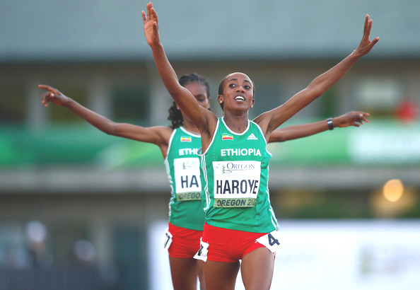 Alemitu Heroye and Alemitu Hawi of Ethiopia cross the finish line to finish first and second respectively in the women's 5000m during day two of the IAAF World Junior Championships at Hayward Field on July 23, 2014 in Eugene, Oregon. (July 22, 2014 - Source: Jonathan Ferrey/Getty Images North America)