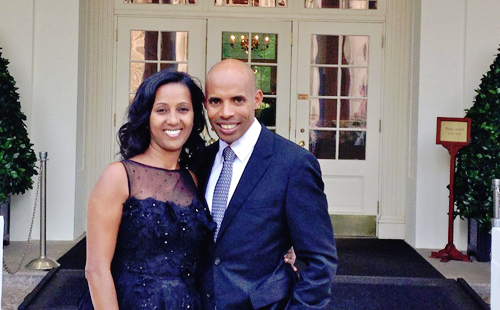 Meb Keflezighi and his wife, Yordanos Asgedom, pose outside the White House. -