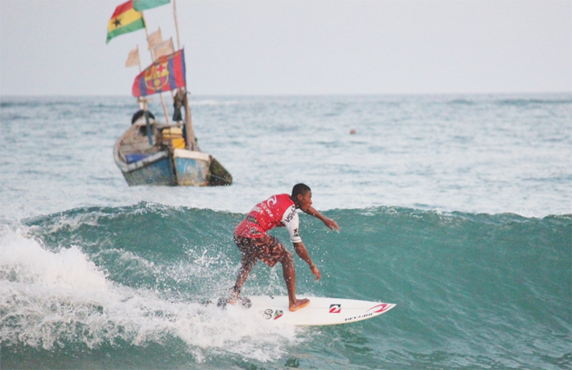A surfer shreds along a wave at Busua beach -Photograph: Julia Overas/Black Star Surf Shop -