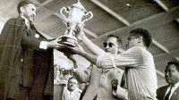 Luciano receiving the cup