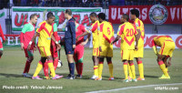 (Saint George players protest Tunisian referee Nasrallah Jawadi's decision to award a penalty kick. (Photo Credit: Yakoub Jamous) - 