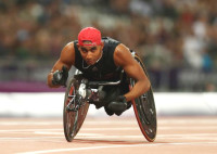 Walid Ktila of Tunisia wins gold in the men's 200m T34 final on day 6 of the London 2012 Paralympic Games © • Getty Images - 